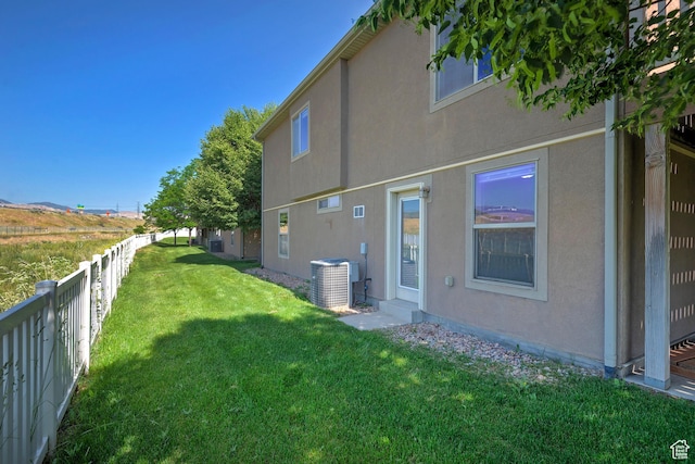 3423 W Mount Cortina Way, Riverton, UT 84065 - rear view of house with cooling unit and stucco siding