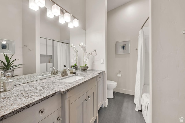 6339 E Quail Ln, Huntsville, UT 84317 - bathroom featuring vanity, toilet, baseboards, and shower / bathtub combination with curtain