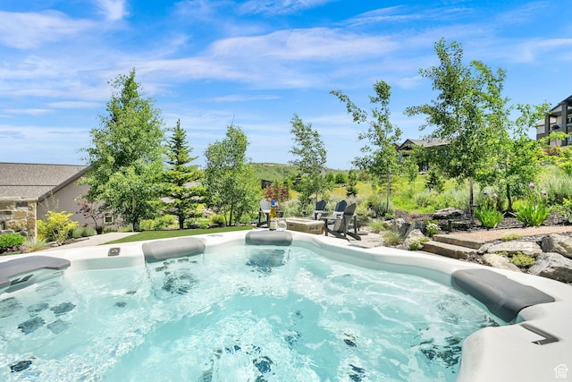 6339 E Quail Ln, Huntsville, UT 84317 - view of swimming pool with an outdoor fire pit and a patio