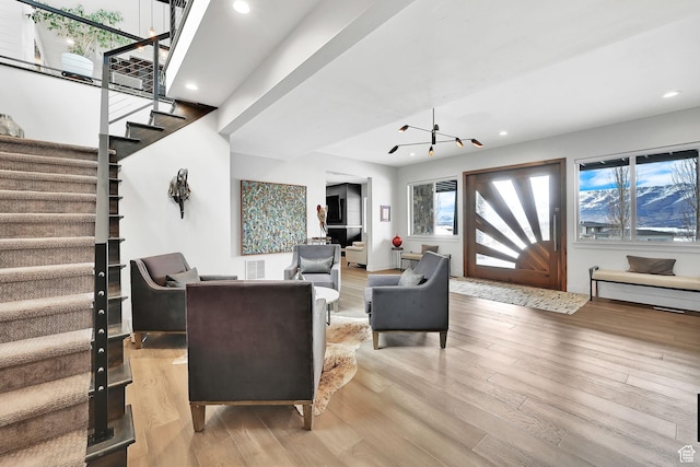 6339 E Quail Ln, Huntsville, UT 84317 - living area with stairs, light wood-style floors, recessed lighting, and a chandelier