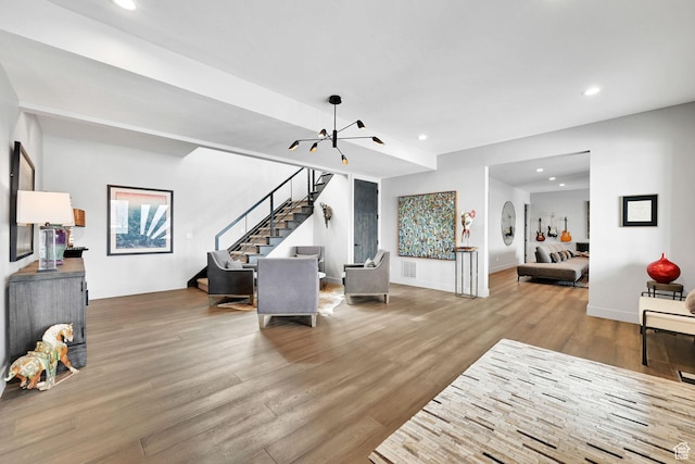 6339 E Quail Ln, Huntsville, UT 84317 - living room featuring a chandelier, stairs, wood finished floors, recessed lighting, and baseboards