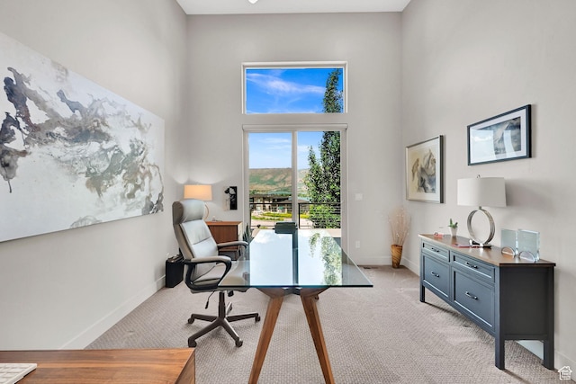 6339 E Quail Ln, Huntsville, UT 84317 - office area with light carpet, a high ceiling, and baseboards