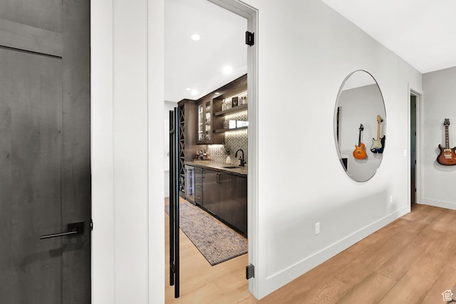 6339 E Quail Ln, Huntsville, UT 84317 - corridor with light wood-style floors, a sink, baseboards, and recessed lighting