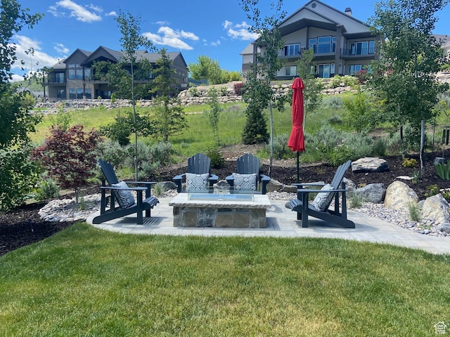 6339 E Quail Ln, Huntsville, UT 84317 - view of grassy yard featuring a patio and a fire pit