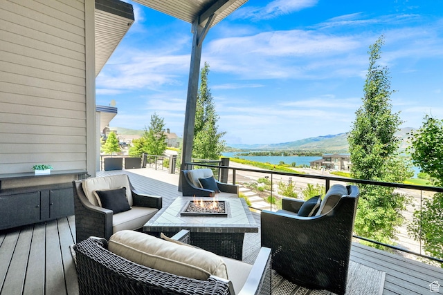 6339 E Quail Ln, Huntsville, UT 84317 - wooden deck with a water view and an outdoor living space with a fire pit