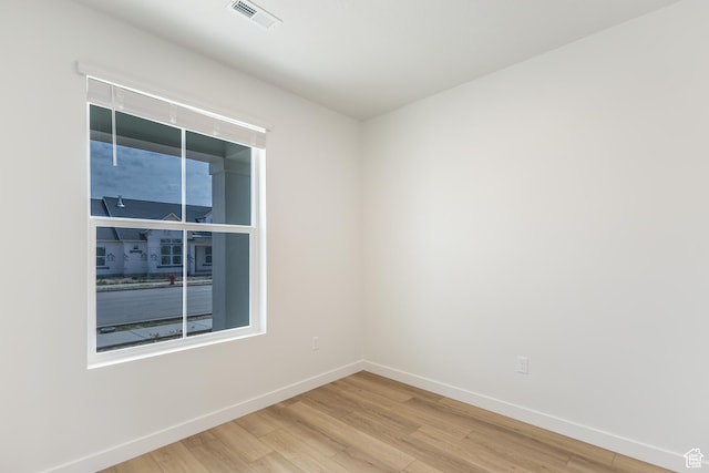 6 S 3830 W Unit 417, West Point, UT 84015 - empty room with light wood-style flooring and baseboards