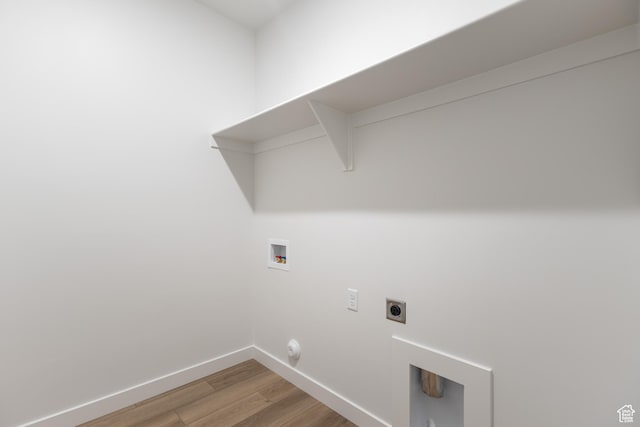 6 S 3830 W Unit 417, West Point, UT 84015 - laundry room with washer hookup, light wood-type flooring, baseboards, hookup for an electric dryer, and hookup for a gas dryer