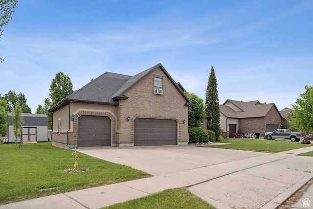 473 W 175 N, Morgan, UT 84050 - view of front of house featuring brick siding, a front lawn, concrete driveway, and cooling unit