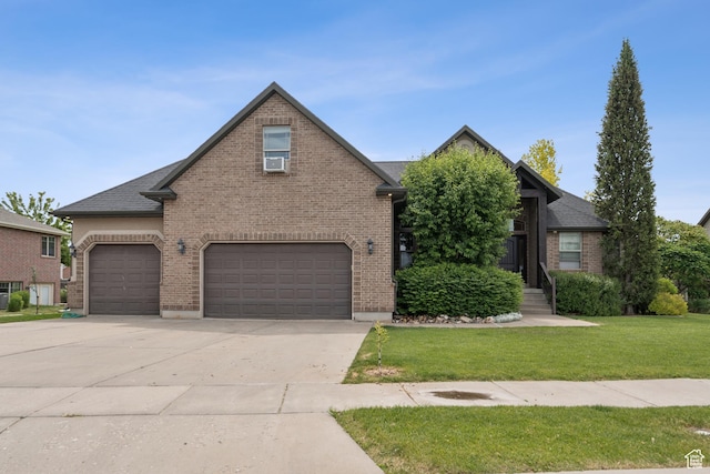 473 W 175 N, Morgan, UT 84050 - view of front facade with brick siding, concrete driveway, and a front lawn