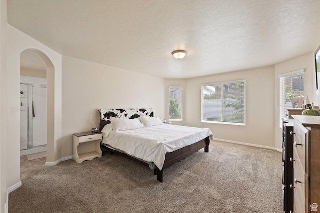 6165 W Haven Ridge Way S, West Valley City, UT 84128 - carpeted bedroom with arched walkways and baseboards