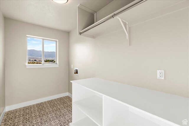 178 S Liberty St Unit 206, Grantsville, UT 84029 - laundry room with baseboards and washer hookup