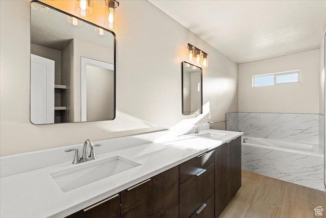 178 S Liberty St Unit 206, Grantsville, UT 84029 - bathroom with double vanity and a bath
