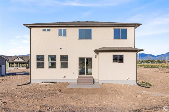 178 S Liberty St Unit 206, Grantsville, UT 84029 - back of property with a mountain view and stucco siding