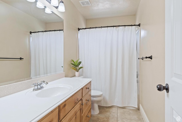 2367 S Wesson Dr, Saratoga Springs, UT 84045 - full bath with vanity, toilet, tile patterned flooring, a shower with shower curtain, and baseboards