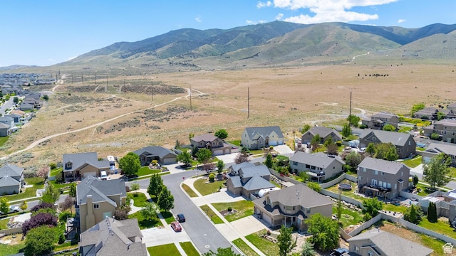 2367 S Wesson Dr, Saratoga Springs, UT 84045 - aerial overview of property's location featuring nearby suburban area and a mountainous background