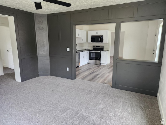 930 E 22nd St, Ogden, UT 84401 - unfurnished room with ceiling fan, light carpet, and a sink