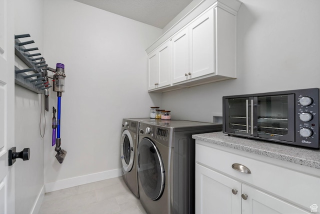 722 N Meridian Dr, Saratoga Springs, UT 84045 - laundry room featuring washer and dryer, cabinet space, and baseboards
