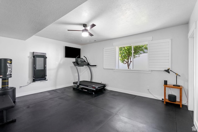 722 N Meridian Dr, Saratoga Springs, UT 84045 - exercise room featuring baseboards, a textured ceiling, and ceiling fan