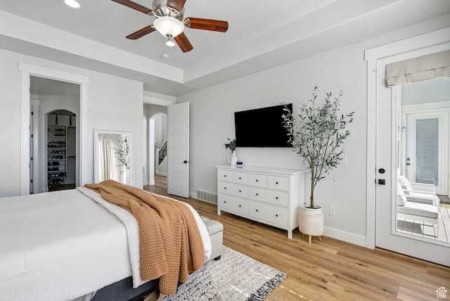 722 N Meridian Dr, Saratoga Springs, UT 84045 - bedroom with arched walkways, light wood-style flooring, baseboards, recessed lighting, and a ceiling fan