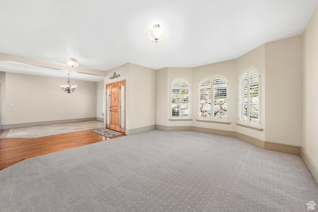 1596 E Millbrook Way S, Bountiful, UT 84010 - unfurnished room featuring light carpet, a chandelier, and baseboards