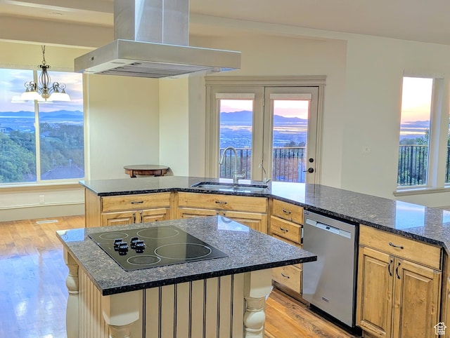 1596 E Millbrook Way S, Bountiful, UT 84010 - kitchen featuring wall chimney exhaust hood, black electric cooktop, stainless steel dishwasher, a sink, and light wood-style floors