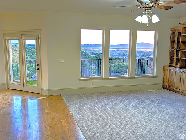 1596 E Millbrook Way S, Bountiful, UT 84010 - unfurnished room featuring ceiling fan, wood finished floors, and baseboards