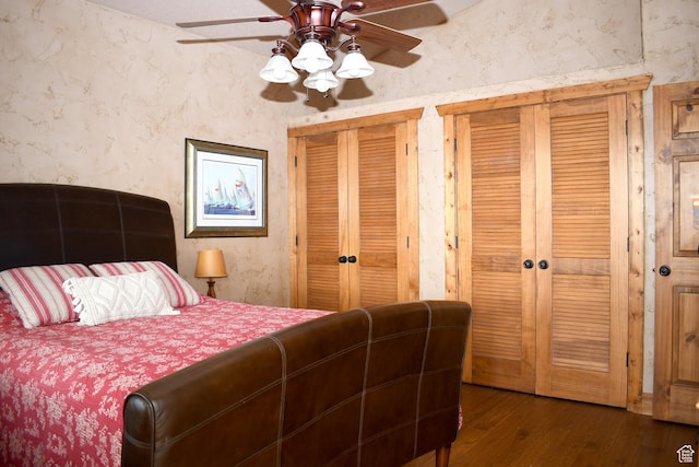 45 Wedge Way, Garden City, UT 84028 - bedroom featuring multiple closets, dark wood-type flooring, and ceiling fan