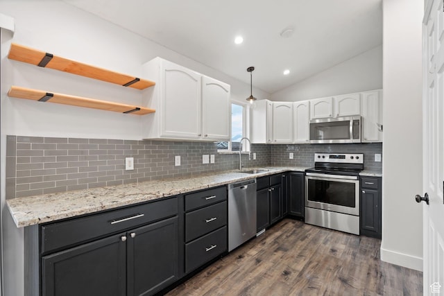 3355 E Golden Eagle Rd, Eagle Mountain, UT 84005 - kitchen featuring stainless steel appliances, open shelves, white cabinets, a sink, and lofted ceiling