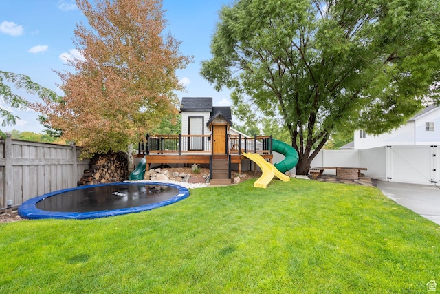 3355 E Golden Eagle Rd, Eagle Mountain, UT 84005 - view of yard with a trampoline, a playground, and a gate