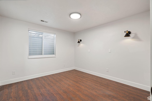 3355 E Golden Eagle Rd, Eagle Mountain, UT 84005 - empty room featuring baseboards and dark wood finished floors