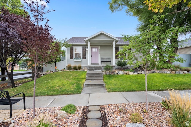 3355 E Golden Eagle Rd, Eagle Mountain, UT 84005 - view of front of home featuring roof with shingles and covered porch