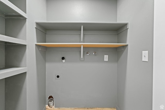 3355 E Golden Eagle Rd, Eagle Mountain, UT 84005 - laundry room with electric dryer hookup, gas dryer hookup, and baseboards