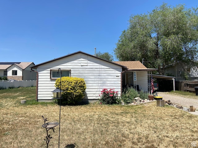 1802 W 5000 S, Taylorsville, UT 84129 - view of property exterior with an attached carport