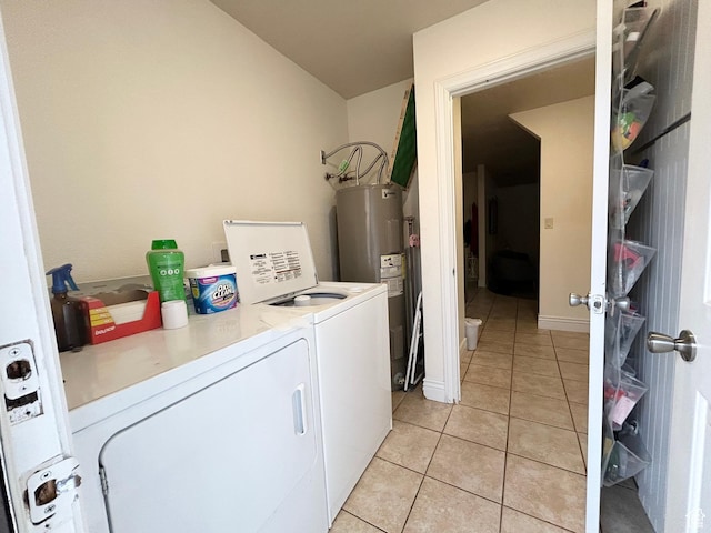 344 E Vermillion Ave, St George, UT 84790 - washroom featuring washing machine and clothes dryer, light tile patterned floors, and water heater