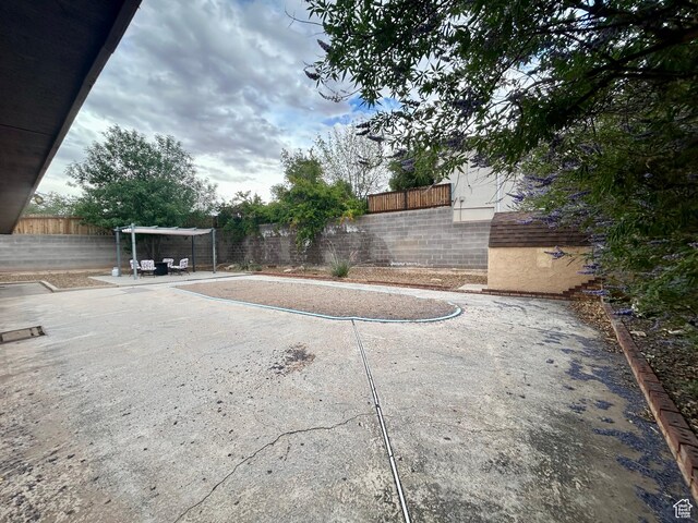 344 E Vermillion Ave, St George, UT 84790 - fenced backyard with a patio