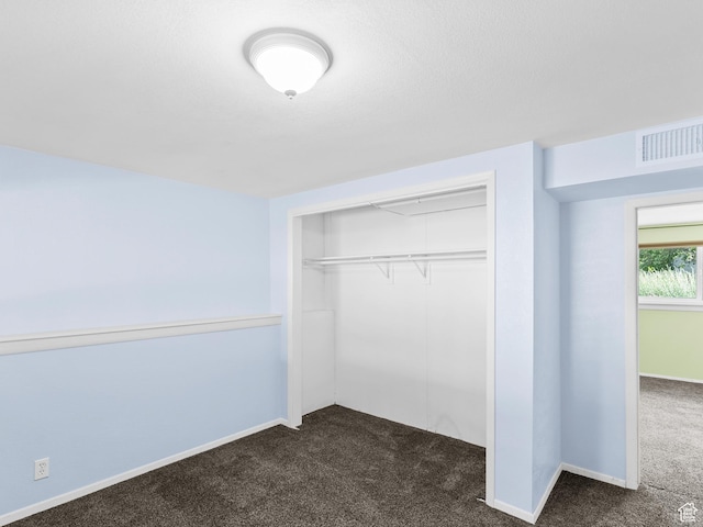 544 W 425 S, Layton, UT 84041 - unfurnished bedroom featuring dark colored carpet, a closet, and baseboards