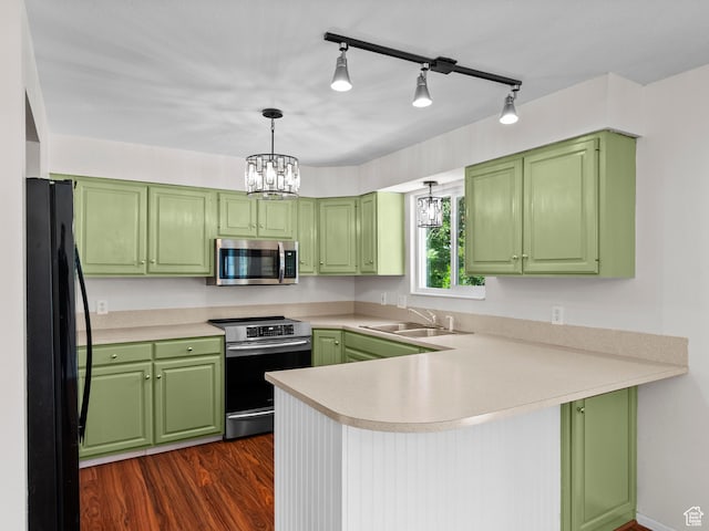 544 W 425 S, Layton, UT 84041 - kitchen with stainless steel appliances, a sink, green cabinetry, and a peninsula