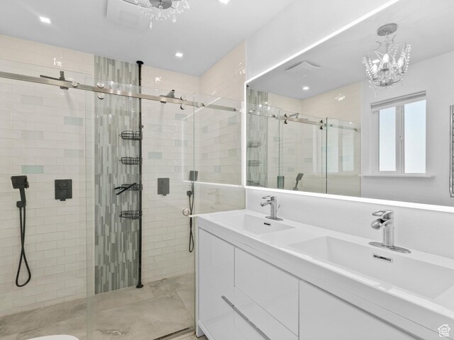 544 W 425 S, Layton, UT 84041 - full bathroom featuring a stall shower, double vanity, a chandelier, and recessed lighting