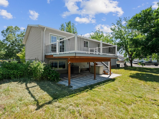 544 W 425 S, Layton, UT 84041 - back of property with a patio area, a yard, a deck, stairs, and a jacuzzi