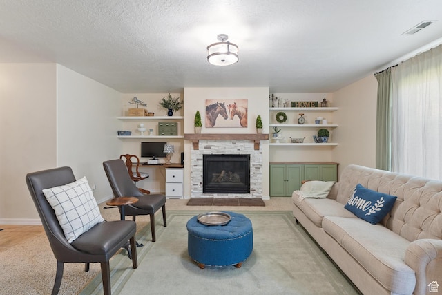 892 W Mattea, Springville, UT 84663 - living room with a fireplace, light colored carpet, built in features, and a textured ceiling