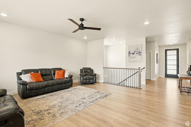 4657 W 275 N, Cedar City, UT 84720 - living room featuring light wood finished floors, recessed lighting, ceiling fan, and baseboards