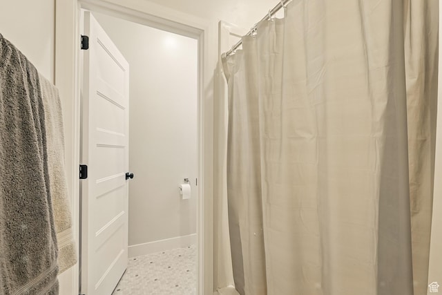 4657 W 275 N, Cedar City, UT 84720 - bathroom with baseboards and a shower with shower curtain