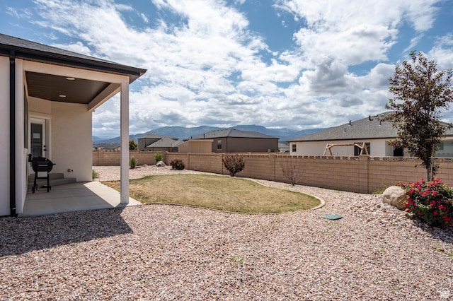 4657 W 275 N, Cedar City, UT 84720 - fenced backyard featuring a patio area and a mountain view