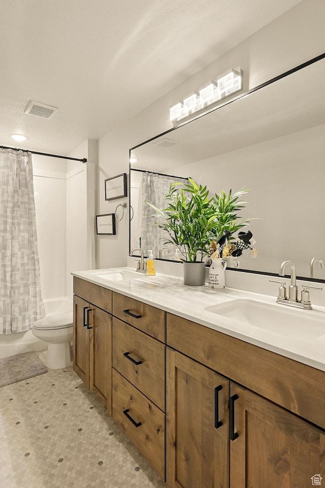 4657 W 275 N, Cedar City, UT 84720 - bathroom with double vanity, toilet, and shower / bath combo