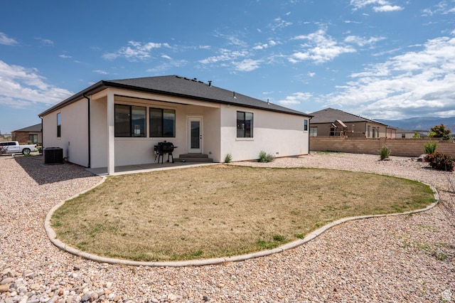 4657 W 275 N, Cedar City, UT 84720 - rear view of house featuring central air condition unit, stucco siding, and a patio area