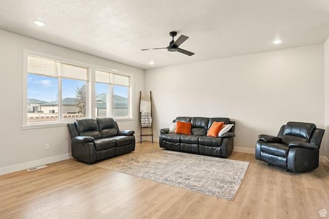 4657 W 275 N, Cedar City, UT 84720 - living room with ceiling fan, wood finished floors, baseboards, recessed lighting, and a textured ceiling