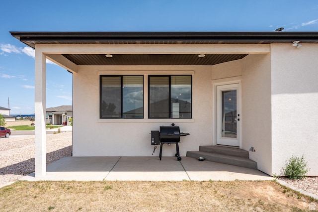 4657 W 275 N, Cedar City, UT 84720 - rear view of property featuring stucco siding and a patio area