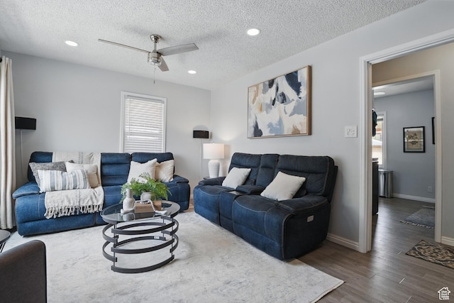 8757 W Helen Dr, Magna, UT 84044 - living room with plenty of natural light, a ceiling fan, wood finished floors, a textured ceiling, and recessed lighting