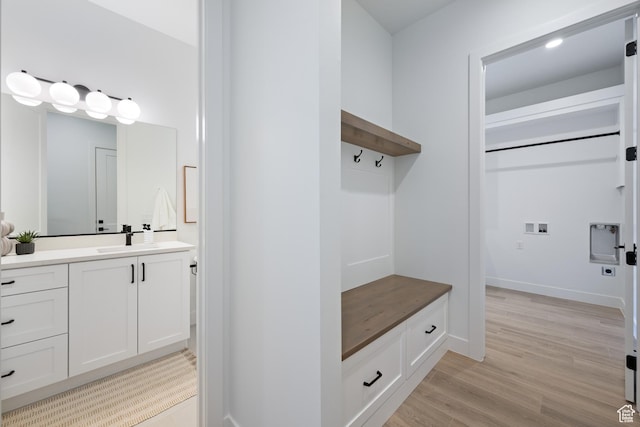 824 S 1690 W, Hurricane, UT 84737 - mudroom featuring a sink and light wood-style flooring