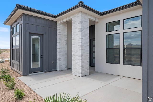 824 S 1690 W, Hurricane, UT 84737 - property entrance featuring a patio area and brick siding